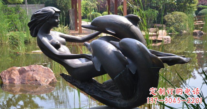 南通公园海豚和女孩景观铜雕
