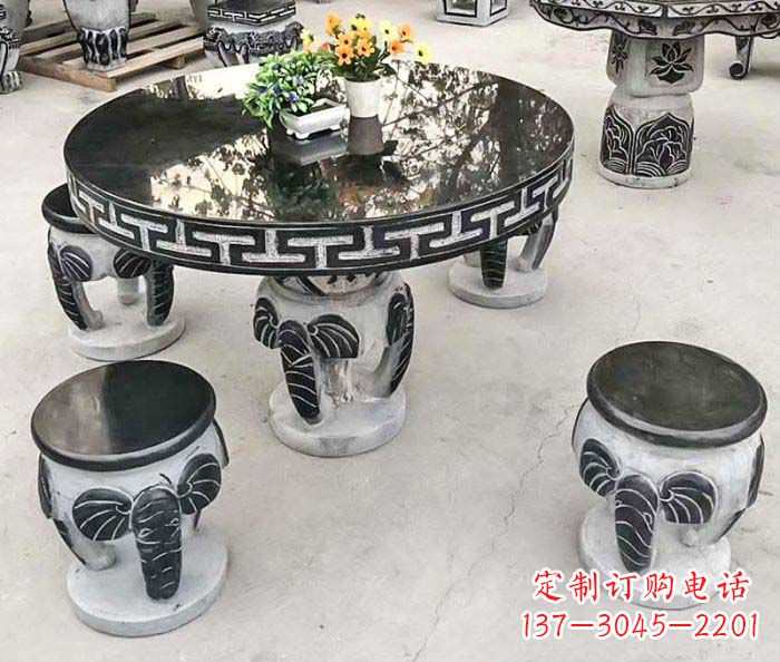 南通圆形桌凳石雕-为公园景观增添艺术气息