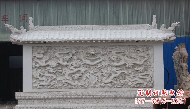 南通九龙壁石雕塑——让礼堂充满豪华气息