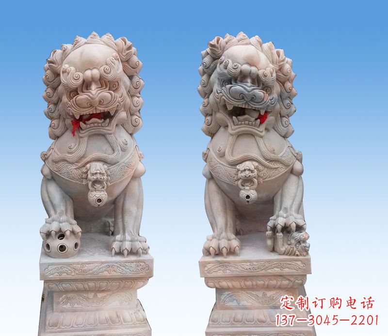 南通晚霞红踩球狮子石雕