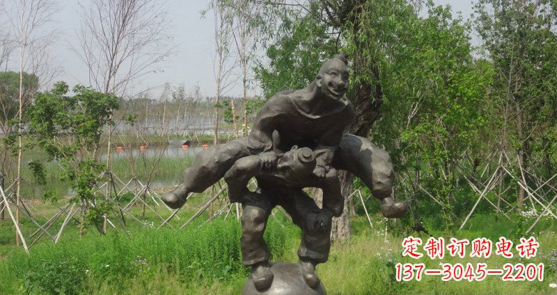南通园林站在球上面跳山羊的人物景观铜雕