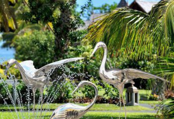 南通鹤雕塑-公园池塘不锈钢镜面抽象喷泉中的鹤雕塑