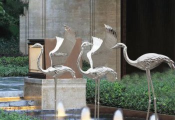 南通鹤雕塑-公园不锈钢镜面喷泉中的鹤雕塑